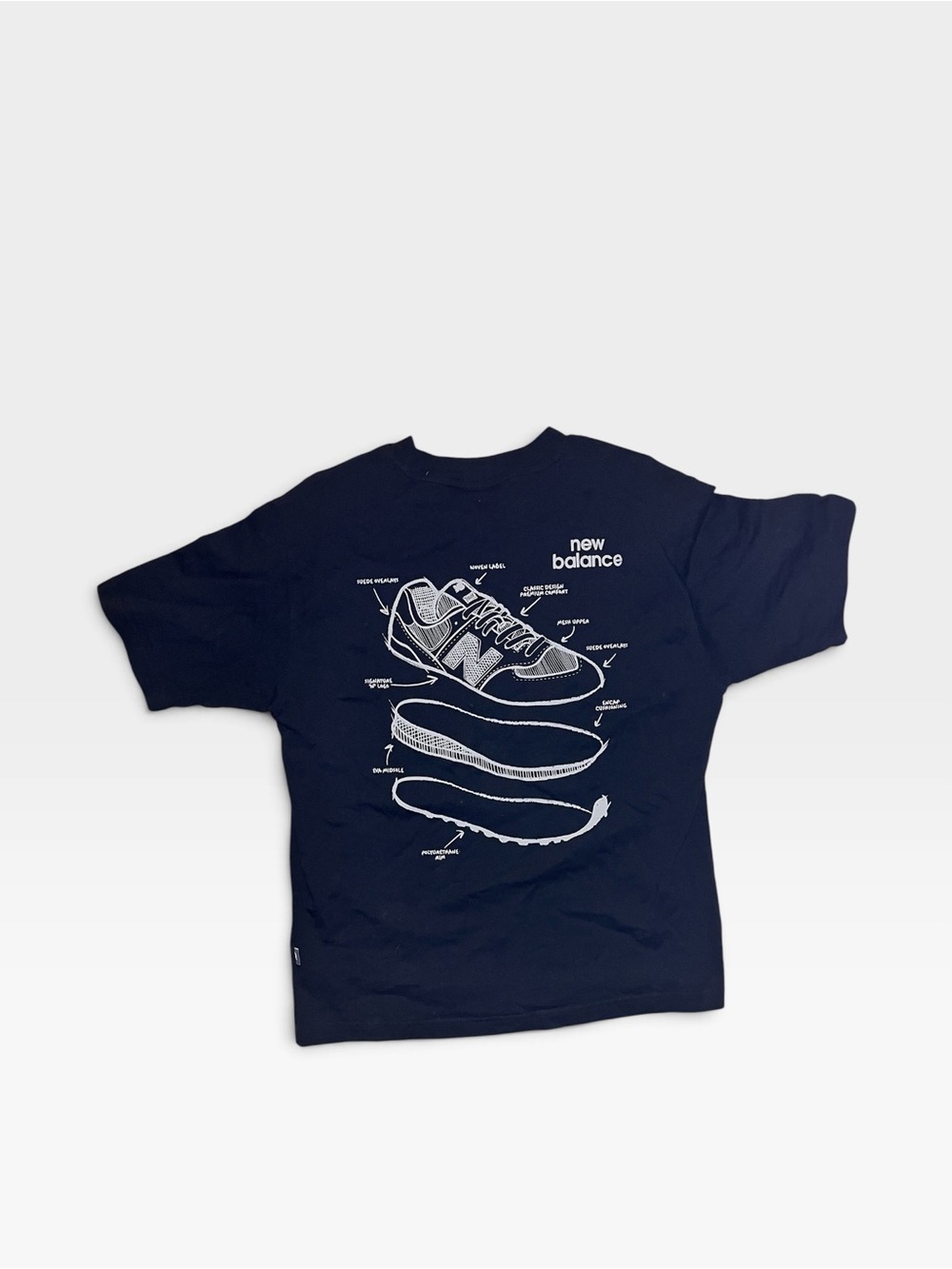 New Balance Black Short Sleeve Tee with White Sneaker Diagram